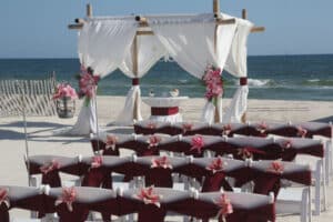 By Color Alabama Beach Wedding venue By Color Princess Burgundy Arbor Flowers Light Pink 1 Big Day Weddings